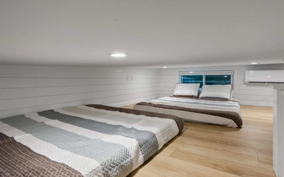 Cozy low-ceiling loft with two beds